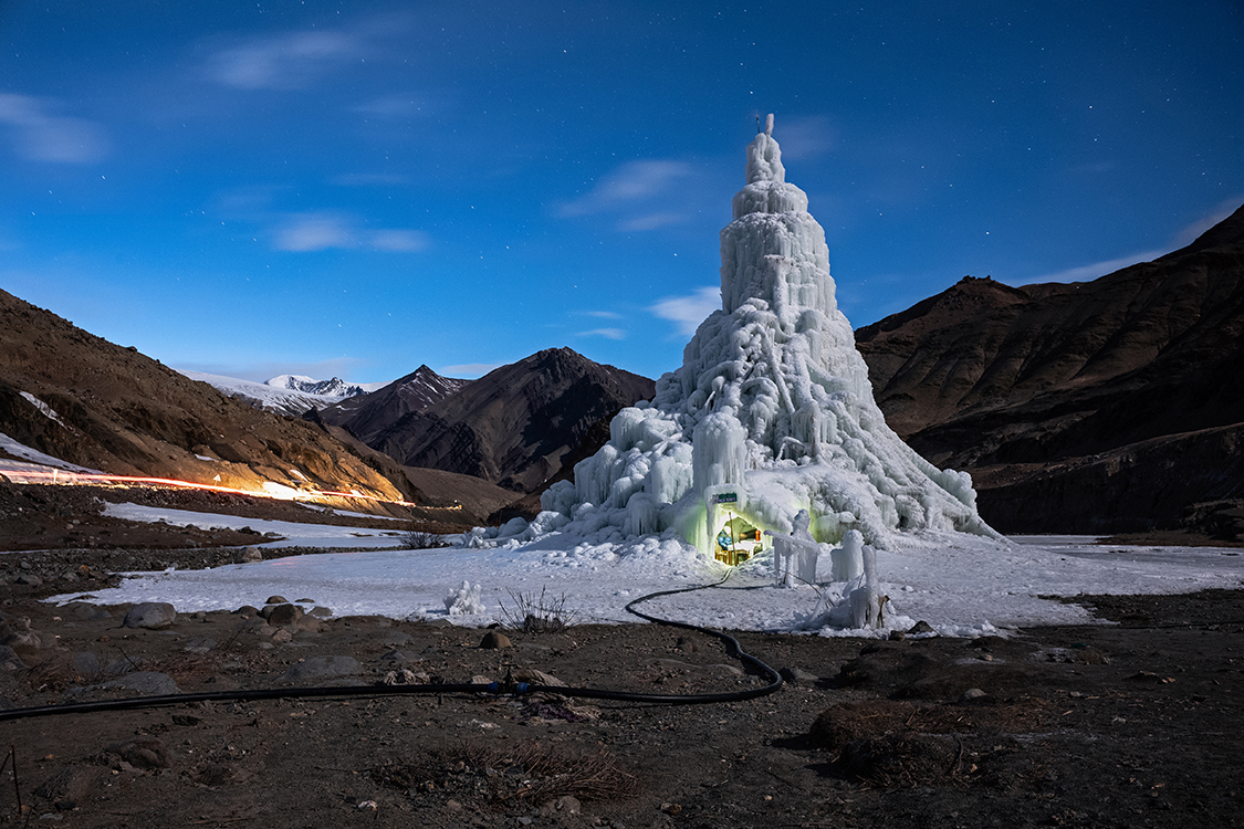 6_Ciril Jazbec_for National Geographic.jpg - Gya Ice stupa. (90 kms from Leh towards east)https://goo.gl/maps/g44QnJ2VTBQ2Gya Village is the first Village settlement of Ladakh. The village is still not been influenced by the modernization and it still works on old sustainable lifestyles. The youth association Gya is one of the most active group in Ladakh and they provide platforms for upcoming youth of their village through workshops and education coaching camps. This Ice stupa is been built by the youth of Gya and is Indiaâ€™s first Ice Cafe. The Ice stupa is made near a stream, although unlike others this Ice stupa wonâ€™t provide water for irrigation but they are planning to use this water for plantation. This winter Gya has been main attraction for winter destination for both locals and outsiders as an alternative to Phyang ice stupa last year.NOTES NAME - NAWANG PHUNTSOGAGE - 27 yrsOCCUPATION - ELECTRICTION" I heard about the ice stupa competition and thought would be nice to buid ice stupa. I told my friends about the competition and not many showed interest in it. So finally we three agreed to make ice stupa. I visited Phyang ice stupa last year and I have seen lots of people are visiting there, so I thought our ice stupa at Gya would be a tourist attraction in winter"NAME - JIGMET TUNDUP AGE - 32 yrs OCCUPATION - FARMER " Initially when i heard about the ice stupa making competition from my friends I got excited as i would get an opportunity to learn new work in winter."TECHNICAL CHALLENGESThe main challenge was to build the dome and we gathered all the information from others how they are making dome. We don't want to our dome to  be weak unsuccesful. Finally we built our dome with 20ft GI pipe and it was quite strong.IDEA ABOUT ICE CAFE ?There were lots of visitors at ice stupa and since Gya is quite far from Leh, they were asking about restaurants nearby. Finallly some people started asking about tea and snacks. Then one day bus full students manjushri school came to visit